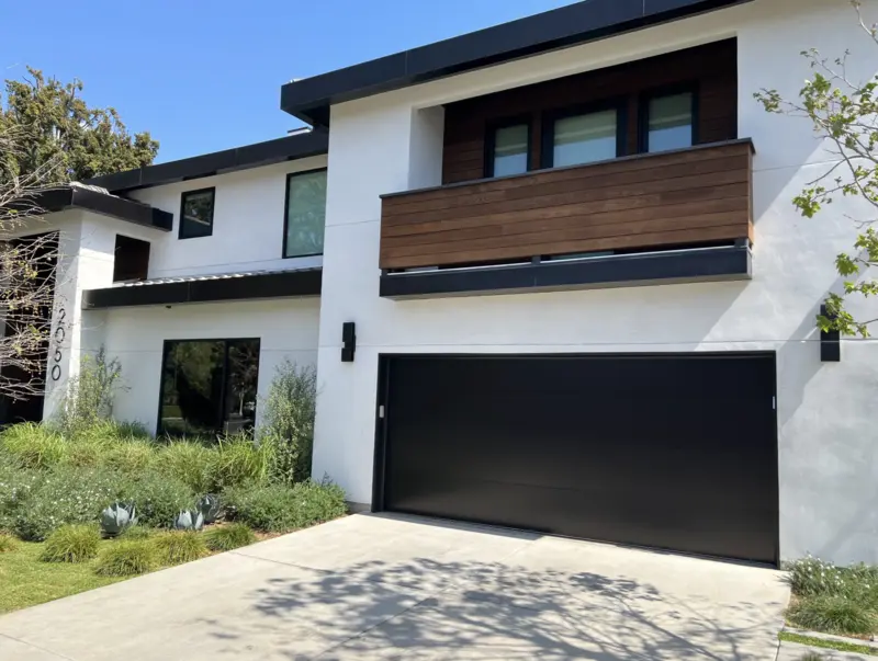 garage featuring two large doors